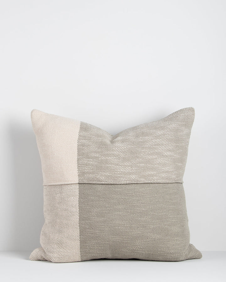 Antoine Cushion Set a relaxed tone with a modern take on country style. Crafted from thick, textural cotton, the Antoine features an asymmetric plaid design in jacquard weave. Soft sage and ivory tones come together to convey an inviting and comforting ae