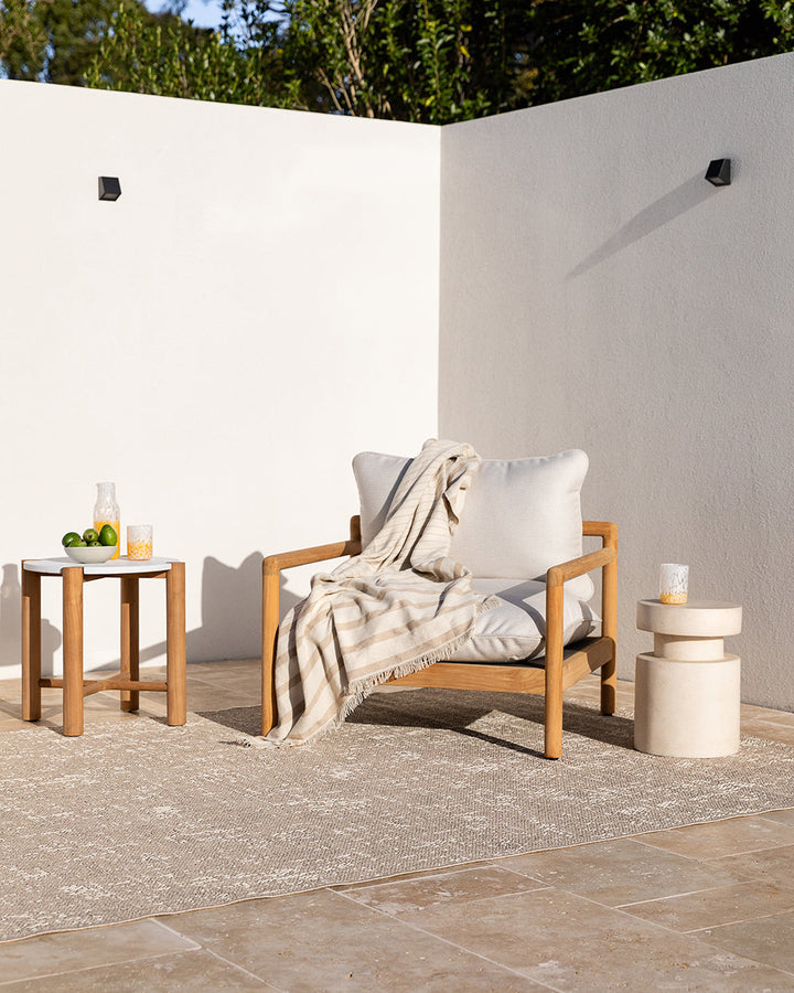 Banksia Throw A relaxed sense of living is reflected in the understated design of our Banksia throw. Woven from soft PET yarn, the inherent durability of this fibre allows this piece to transition from outside at the pool, to indoors on the couch. This pi