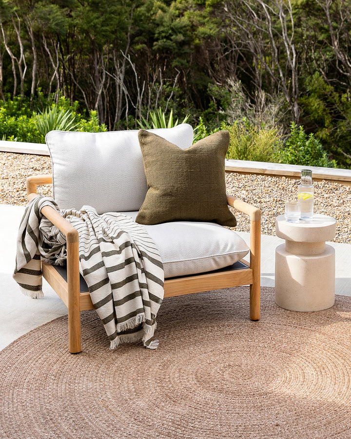 Banksia Throw A relaxed sense of living is reflected in the understated design of our Banksia throw. Woven from soft PET yarn, the inherent durability of this fibre allows this piece to transition from outside at the pool, to indoors on the couch. This pi