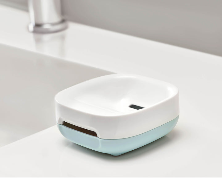 Buy online & save Slim™ Compact Soap Dish | BEON.COM.AU  This clever soap dish has a unique, sloping design that saves space and allows any excess water or suds from your soap to neatly drain away.  Unique, sloping design saves space Holds a full-size soap bar in less space Clever angled base allows soap to drain Dismantles for easy cleaning Ventilate... Joseph Joseph at BEON.COM.AU