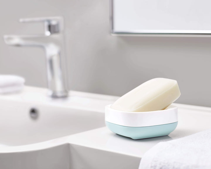 Buy online & save Slim™ Compact Soap Dish | BEON.COM.AU  This clever soap dish has a unique, sloping design that saves space and allows any excess water or suds from your soap to neatly drain away.  Unique, sloping design saves space Holds a full-size soap bar in less space Clever angled base allows soap to drain Dismantles for easy cleaning Ventilate... Joseph Joseph at BEON.COM.AU