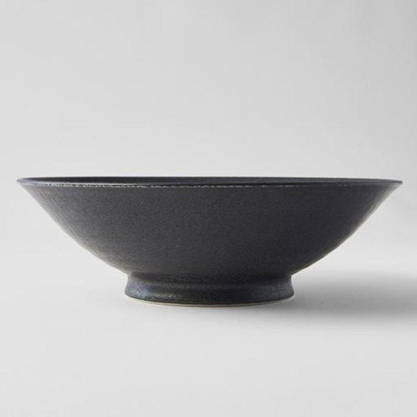 Save on BB Black Ramen Bowl Made in Japan at BEON. 25cm diameter x 8cm height Ramen Bowl in BB Black design A mottled black glaze highlighted with iridescent blue. Each piece has a unique dappled pattern determined by its position in the kiln during the firing process. Traditionally used for ramen, this bowl can be used for curries, risottos, salads or pasta. The ramen bowl makes a great engagement or wedding gift.Handcrafted in JapanMicrowave and dishwasher safe