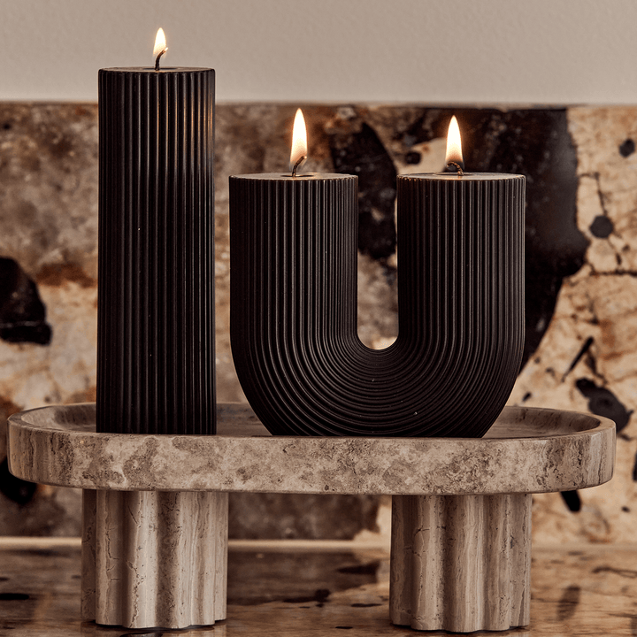 Curl Curl Candle - Black Pillar Candle Available at BEON | Curl Curl is the name of a beach in Sydney. The word Curl Curl may have been derived from a Dharuk Aboriginal phrase curial curial, meaning river of life. The shape of the Curl Curl candle is insp