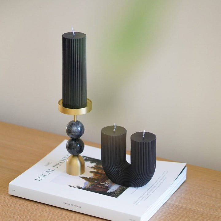 Curl Curl Candle - Black Pillar Candle Available at BEON | Curl Curl is the name of a beach in Sydney. The word Curl Curl may have been derived from a Dharuk Aboriginal phrase curial curial, meaning river of life. The shape of the Curl Curl candle is insp