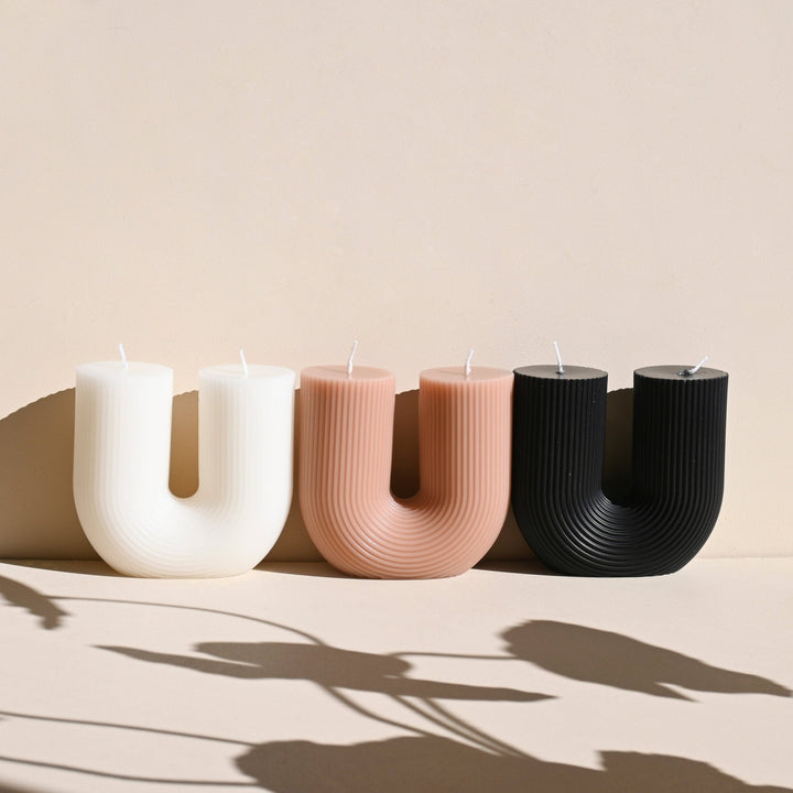 Curl Curl Candle - Black Pillar Candle Available at BEON | Curl Curl is the name of a beach in Sydney. The word Curl Curl may have been derived from a Dharuk Aboriginal phrase curial curial, meaning river of life. The shape of the Curl Curl candle is insp