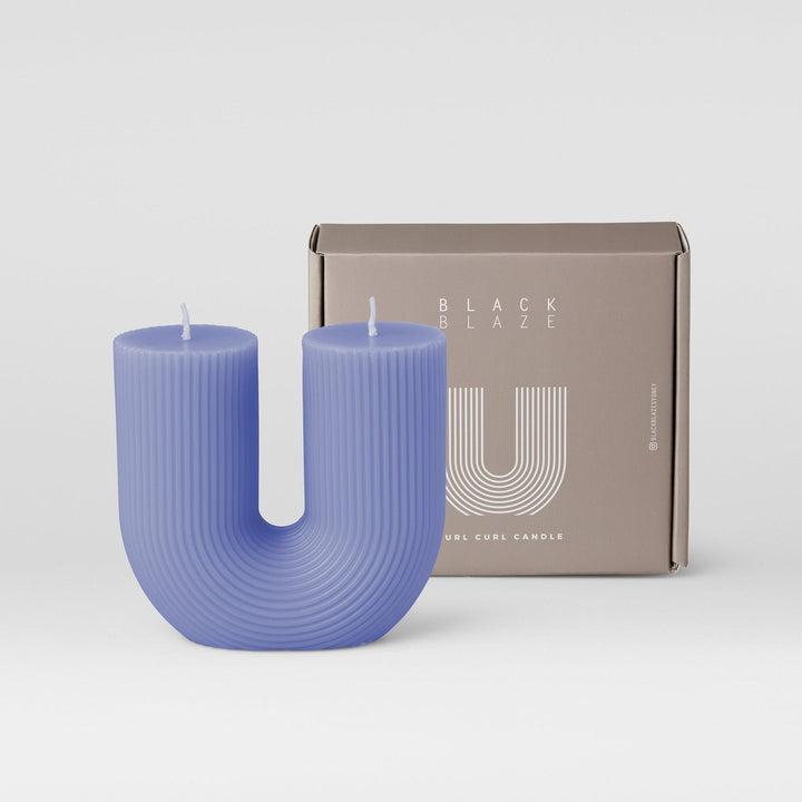 Curl Curl Candle - Lilac Pillar Candle Available at BEON | Curl Curl is the name of a beach in Sydney. The word Curl Curl may have been derived from a Dharuk Aboriginal phrase curial curial, meaning river of life. The shape of the Curl Curl candle is insp