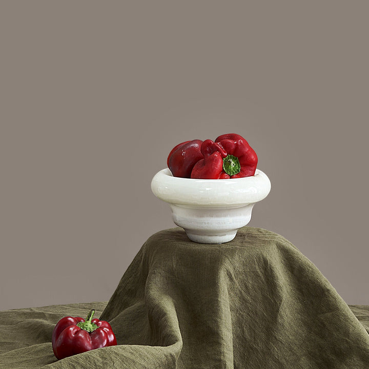 Flow Bowl Accessories Available at BEON | The Flow Bowl is crafted from natural stone with an organic curve on the edge. It is ideal for home decoration. Style it on the console, coffee table or shelf with flowers or ornaments; Or enjoy it with nuts, cook