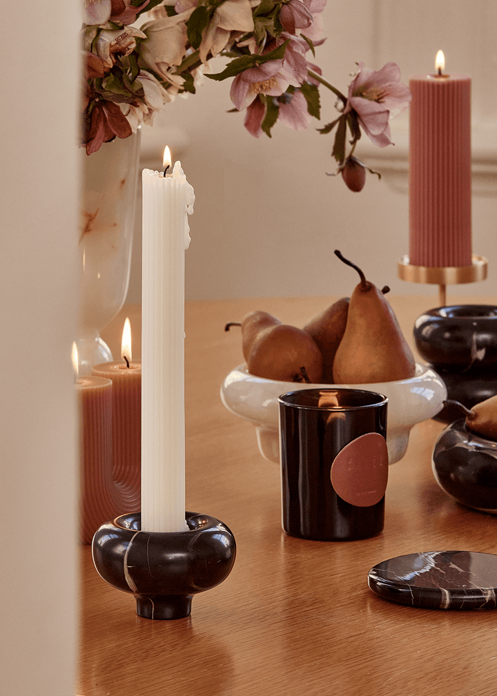 Halo Candle Holder Pillar Candle Available at BEON | Dramatic arcs define the unique charm of the Halo Candle Holder. Its rounded top and slender base capture the essence of mid-century style, exuding an aura of elegance. The stackable design offers versa