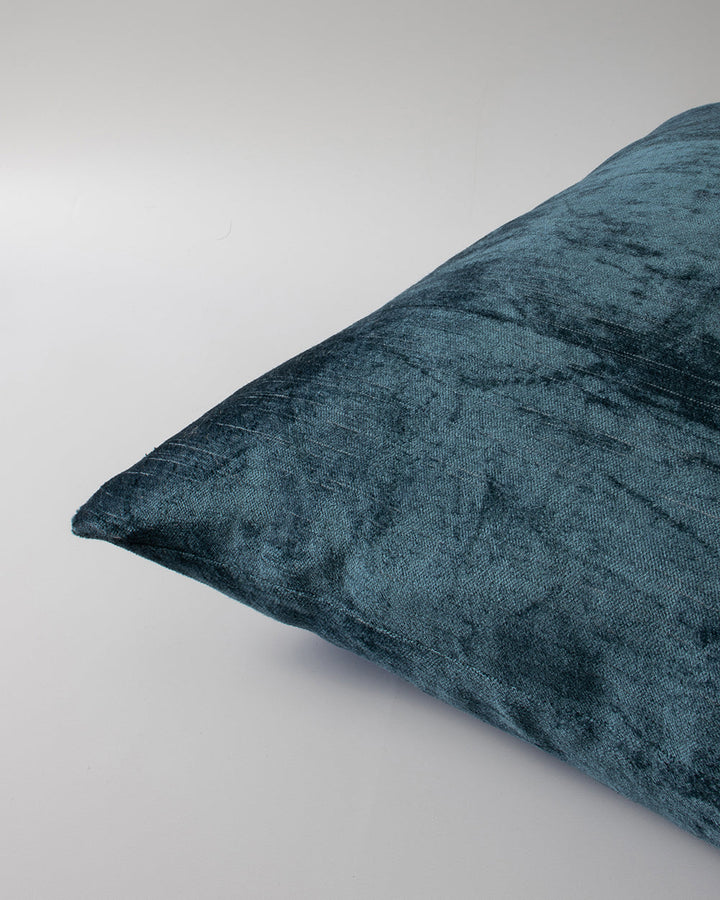 Bromley Square Cushion Embrace contemporary luxury with Bromley, a finely woven cotton and viscose slub velvet. Double-sided with a lustrous sheen, the opulent teal tone creates an effortlessly sophisticated aesthetic. Pair with our Bromley lumbar cushion