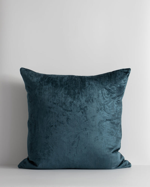 Bromley Square Cushion Embrace contemporary luxury with Bromley, a finely woven cotton and viscose slub velvet. Double-sided with a lustrous sheen, the opulent teal tone creates an effortlessly sophisticated aesthetic. Pair with our Bromley lumbar cushion