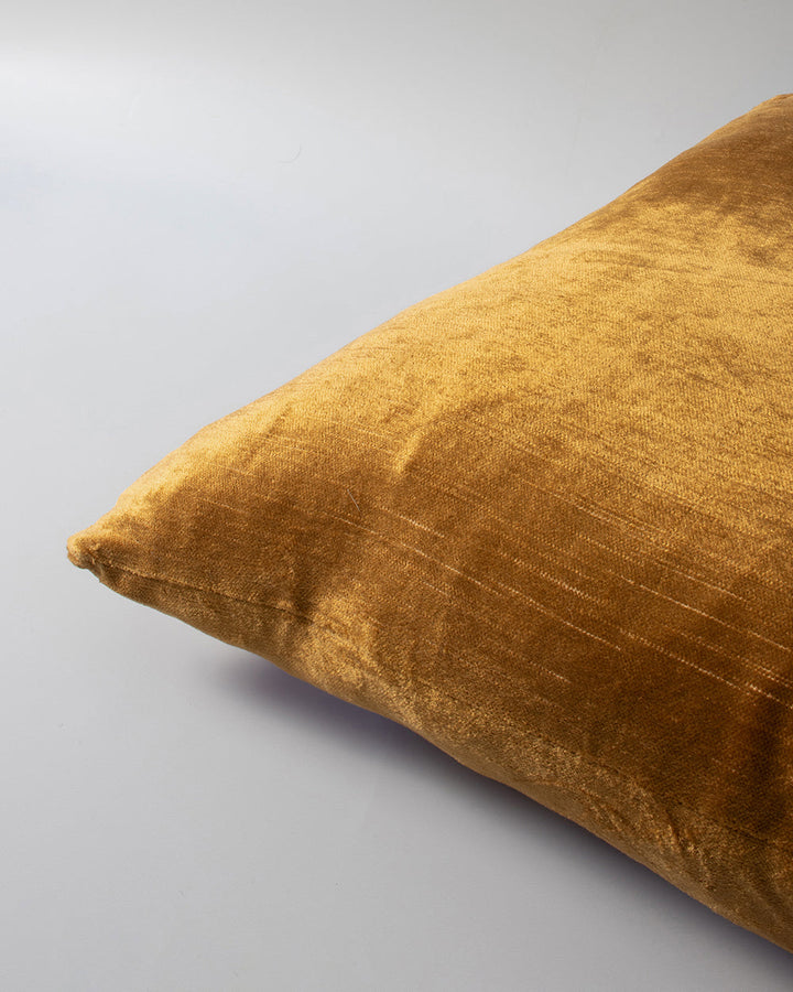 Bromley Square Cushion Embrace contemporary luxury with Bromley, a finely woven cotton and viscose slub velvet. Double-sided with a lustrous sheen, the opulent teal tone creates an effortlessly sophisticated aesthetic. Pair with our Bromley lumbar cushion