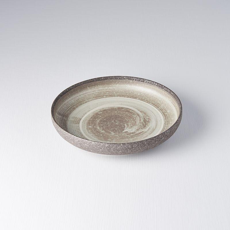 Save on Nin-Rin High Rim Plate Made in Japan at BEON. 22cm diameter x 4.5cm height High Rim Plate in Nin-Rin designThe Nin-Rin range features a circular sweep of golden ochre over the signature 'Earth' glaze. No two pieces are the same due to a unique hand glazing technique used to create the swirling pattern. This high rim shape is the perfect plate to serve risottos, pasta or steak. Use as an everyday plate or when entertaining guests at dinner parties. Handcrafted in JapanMicrowave and dishwasher safe