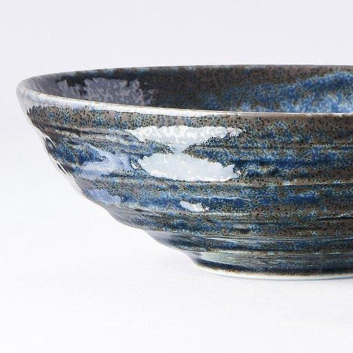 Save on Midnight Blue Small Bowl Made in Japan at BEON. 14cm diameter x 4.5cm height Small Bowl in Midnight Blue design Featuring a dark indigo gloss with subtle brown undertones. The glaze runs over a pattern of concentric circles. It works in perfect harmony with the rustic shapes made by the kiln. This small dish is the perfect size for sauces, dips, snacks or your favourite set dessert. Handcrafted in JapanMicrowave and dishwasher safe.