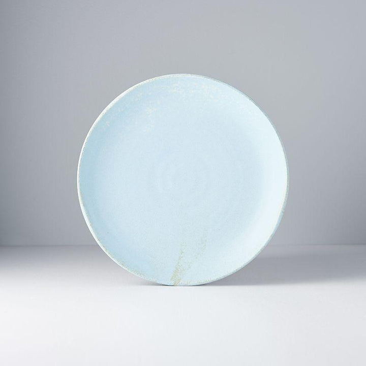 Save on Soda Blue Uneven Plate Made in Japan at BEON. 24.5cm diameter x 3cm height Uneven plate in Soda Blue design The Soda Blue range features a soft pastel blue, highlighted by a gentle play of white. Each piece has a unique pattern determined by its position in the kiln during the firing process. The perfect size plate to use as an everyday dinner plate or to use on special occasions. Handcrafted in JapanMicrowave and dishwasher safe