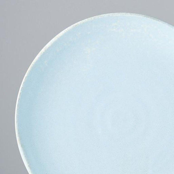 Save on Soda Blue Uneven Plate Made in Japan at BEON. 24.5cm diameter x 3cm height Uneven plate in Soda Blue design The Soda Blue range features a soft pastel blue, highlighted by a gentle play of white. Each piece has a unique pattern determined by its position in the kiln during the firing process. The perfect size plate to use as an everyday dinner plate or to use on special occasions. Handcrafted in JapanMicrowave and dishwasher safe