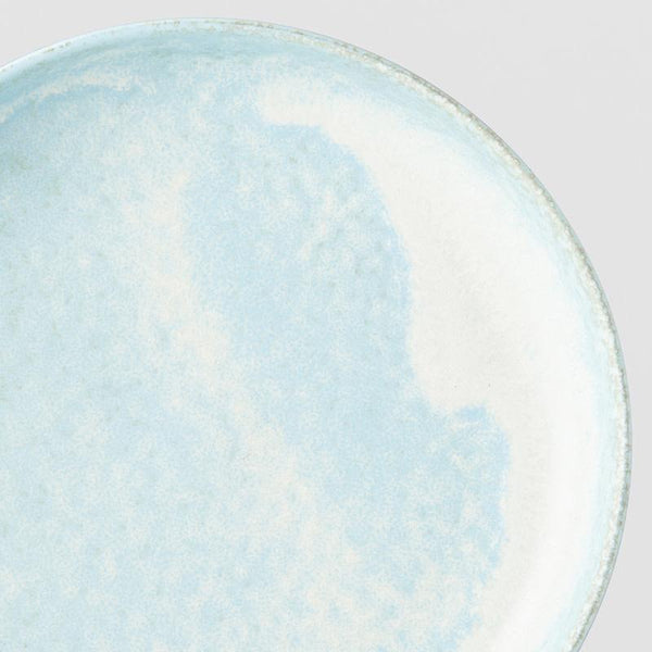 Save on Soda Blue High Rim Plate Made in Japan at BEON. 20cm diameter x 4cm height. High rim plate in Soda Blue design The Soda Blue range features a soft pastel blue, highlighted by a gentle play of white. Each piece has a unique pattern determined by its position in the kiln during the firing process. This high rim shape is the perfect plate to serve risottos, pasta or steak. Use as an everyday plate or when entertaining guests at dinner parties. Handcrafted in JapanMicrowave and dishwasher safe