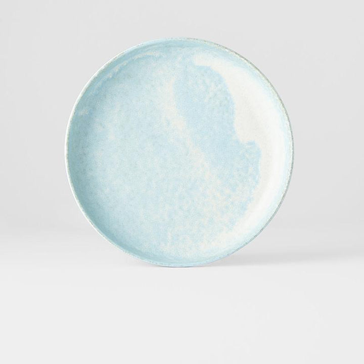 Save on Soda Blue High Rim Plate Made in Japan at BEON. 20cm diameter x 4cm height. High rim plate in Soda Blue design The Soda Blue range features a soft pastel blue, highlighted by a gentle play of white. Each piece has a unique pattern determined by its position in the kiln during the firing process. This high rim shape is the perfect plate to serve risottos, pasta or steak. Use as an everyday plate or when entertaining guests at dinner parties. Handcrafted in JapanMicrowave and dishwasher safe