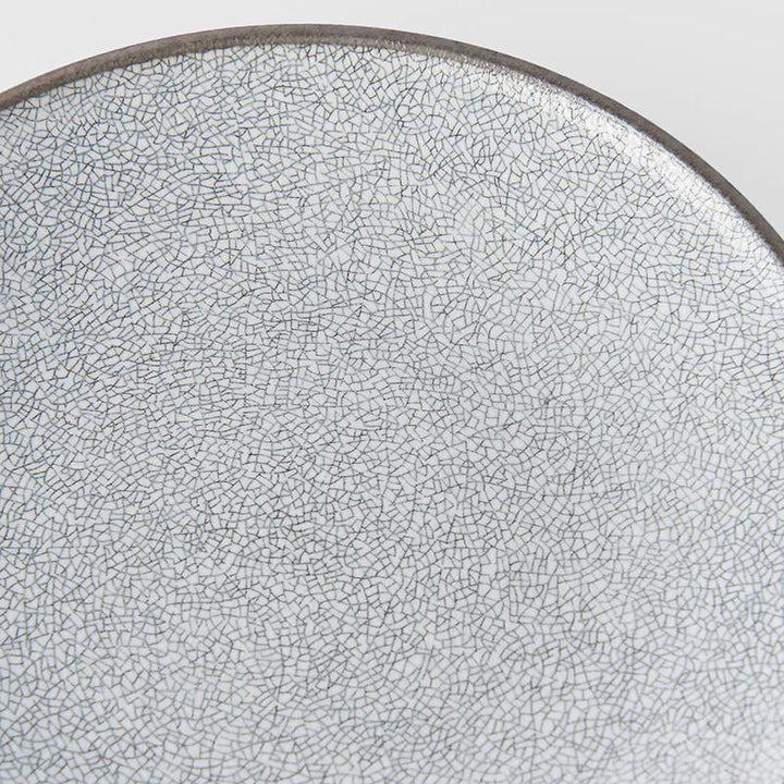 Save on Crazed Grey Dinner Plate Made in Japan at BEON. 25cm diameter Beautiful dinner plate in Crazed Grey design with Earth base The Crazed Grey design has an intricate pattern of linework over a simple matte white background. With the kilns signature 'Earth' glaze on the exterior. These are great as dinner plates or serving plates. Use as everyday dinner plates or use when entertaining guestsHandcrafted in JapanDishwasher and microwave safe