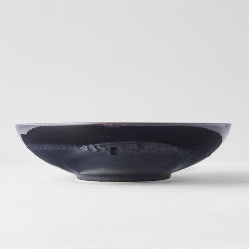 Save on Matte Black with Shiny Edge Open Serving Bowl Made in Japan at BEON. 28cm diameter x 7.5 height Open shape serving bowl in Matte Black with Shiny Edge Design A silvered matte black body, the edge hand-dipped in a rich glossy black. A subtle play of blue and green accents are hidden within the pooling of the glaze. Great piece for table centrepiece, or as a main focus of a buffet style meal serving salads and pasta. Top selling bowl that makes a great gift.Handcrafted in JapanMicrowave and Dishwasher