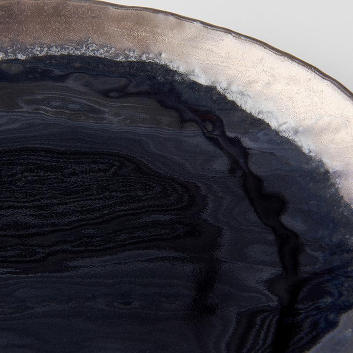 Save on Gloss Black Oval Plate Made in Japan at BEON. 24cm diameter x 20cm width Oval Plate in Gloss Black design. These beautiful plates are perfect as dinner plates or serving plates.Handmade in Japan.Microwave and dishwasher safe