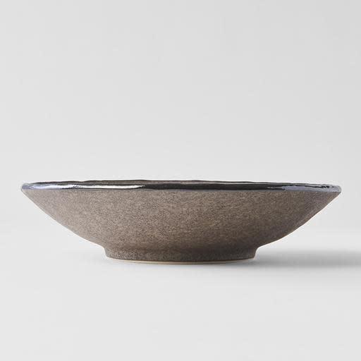 Save on Earth Large Shallow Bowl Made in Japan at BEON. 24cm diameter x 5.5cm height Large Shallow Bowl in Earth design The Earth range features a unique glaze with rustic tones with a focus on simple texture. When turned toward to the light, it shimmers silver. This large shallow bowl is a great shape for sharing dishes. Use for pasta, curries, risottos or salads. Handcrafted in JapanMicrowave and dishwasher safe