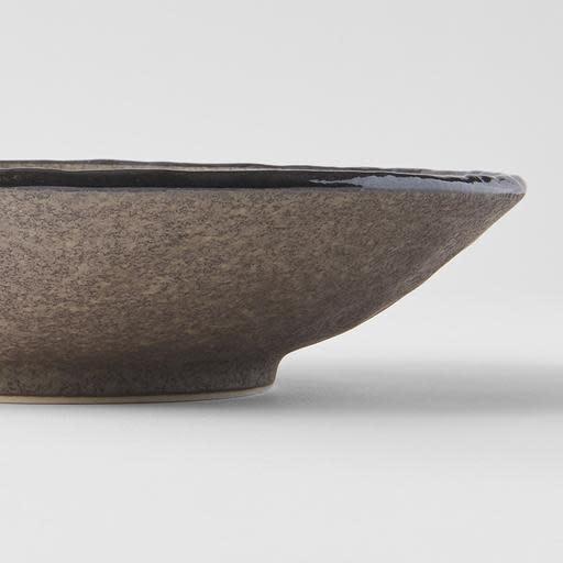 Save on Earth Large Shallow Bowl Made in Japan at BEON. 24cm diameter x 5.5cm height Large Shallow Bowl in Earth design The Earth range features a unique glaze with rustic tones with a focus on simple texture. When turned toward to the light, it shimmers silver. This large shallow bowl is a great shape for sharing dishes. Use for pasta, curries, risottos or salads. Handcrafted in JapanMicrowave and dishwasher safe