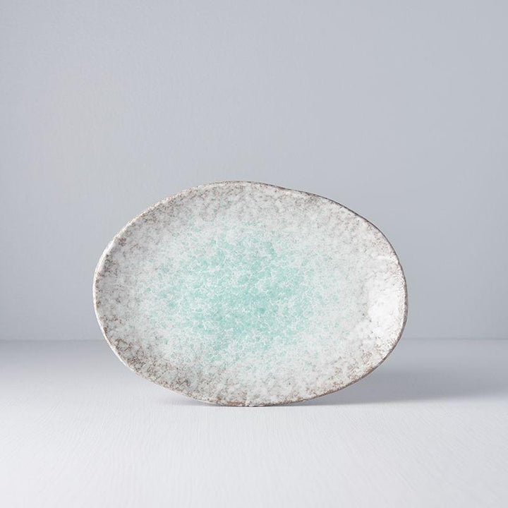 Save on Aqua Splash Large Oval Plate Made in Japan at BEON. 24cm x 17cm diameter Oval Plate in Aqua Splash design. This plate complements a wide range of dishes, particularly seafood and fresh greens. Handmade in Japan. Microwave and dishwasher safe.