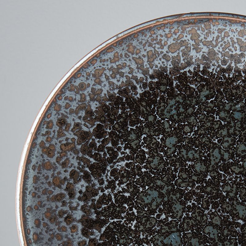Save on Black Pearl Dinner Plate Made in Japan at BEON. 25cm diameter x 3.5 height Dinner plate in Black Pearl design The Black Pearl glaze features a vibrant splash of gloss black against a matte black background. Subtle highlights of cyan are reflected in the depths of the gloss. These are great as dinner plates or serving plates with colourful dishes. Handcrafted in Japan Dishwasher and microwave safe