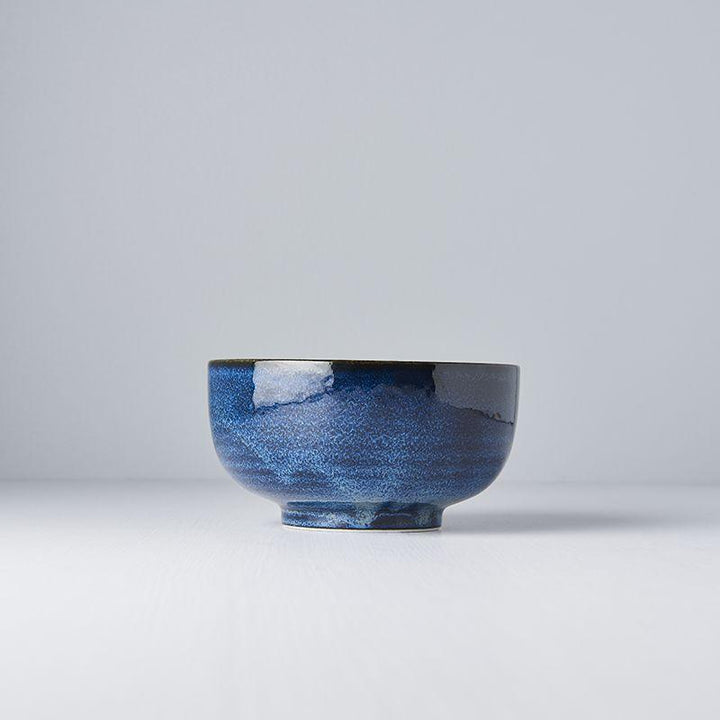 Save on Indigo Blue U Shaped Bowl Made in Japan at BEON. 16cm diameter x 8cm height U Shaped bowl in Indigo Blue design.The Indigo Blue range is a popular glaze due the richness and depth of colour. A unique dappling effect means no two are the same. This bowl can be used for rice, soups and curry.Handcrafted in Japan.Microwave and Dishwasher safe.