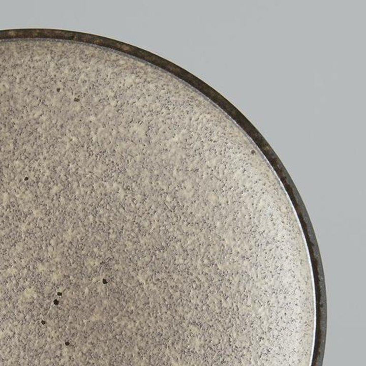 Save on Earth Tapas Plate Made in Japan at BEON. 17cm diameter x 2.5 height Tapas Plate in Earth design The Earth range features a unique glaze with rustic tones with a focus on simple texture. When turned toward to the light, it shimmers silver. Perfect as a plate to enjoy your favourite tapas, use as a side plate, or to serve with your morning or afternoon tea.Handcrafted in JapanMicrowave and dishwasher safe