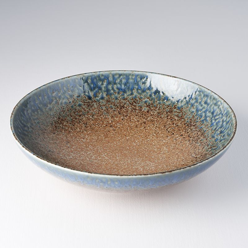 Save on Earth & Sky Open Serving Bowl Made in Japan at BEON. 28cm diameter x 7.5 height Open shape serving bowl in Earth & Sky Design The Earth & Sky range features a hand-dipped edge of bold ink-blue contrasted with a speckled tawny brown. Great piece for table centrepiece, or as a main focus of a buffet style meal serving salads and pasta. Top selling bowl that makes a great gift.Handcrafted in JapanMicrowave and Dishwasher safe