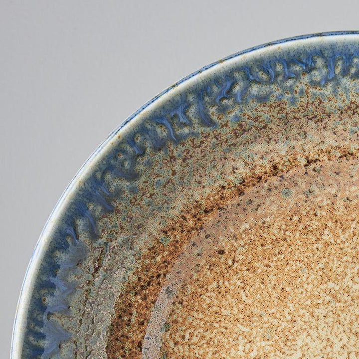 Save on Earth & Sky Flat Base Serving Bowl Made in Japan at BEON. 29cm diameter x 6cm height Flat Base Serving Bowl in Earth & Sky Design The Earth & Sky range features a hand-dipped edge of bold ink-blue contrasted with a speckled tawny brown. This bowl is great for serving salads, pasta or meats. Use as a serving bowl or as a decorative fruit bowl. The flat base serving bowl makes a perfect wedding or engagement gift. Handcrafted in JapanMicrowave and dishwasher safe