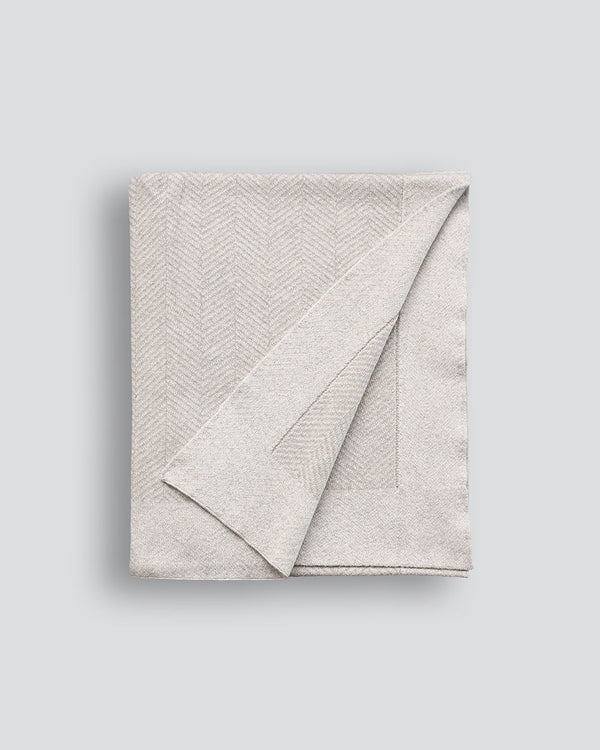 Carmel Organic Throw Create a sense of indulgence with this soft, organic cotton throw in a fine chevron knit. Generous sizing creates a luxurious drape, while the light, fawn colourway is inviting and easy to style. Versatile throughout the seasons. Aust
