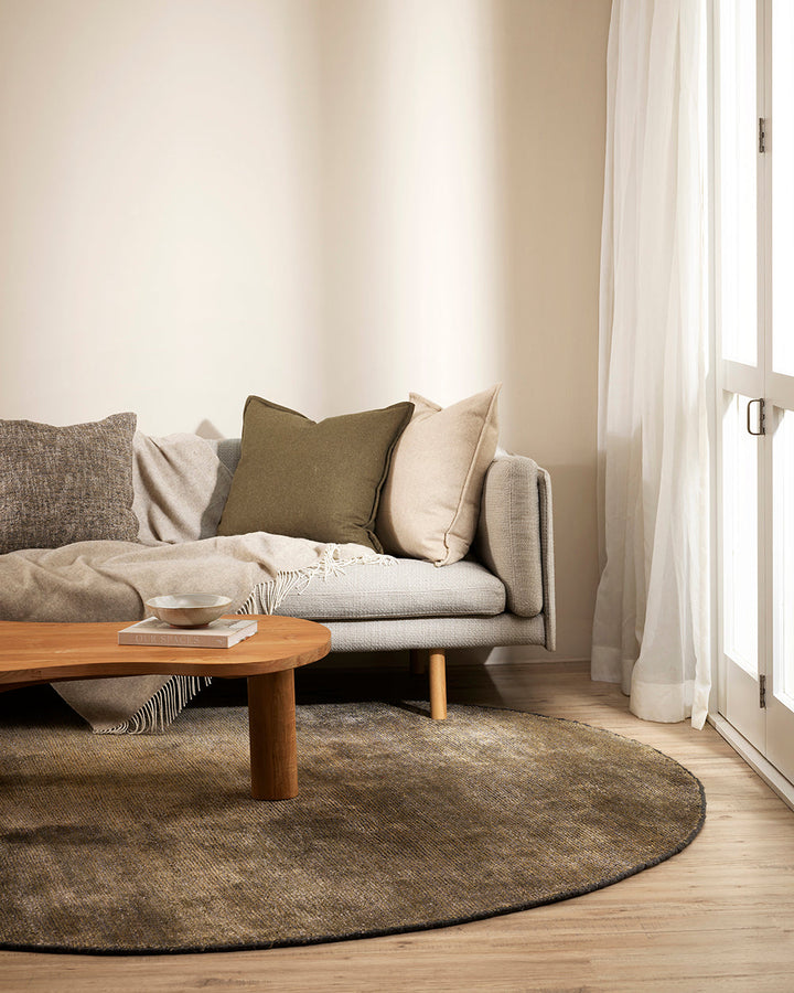 Casa Throw Beautifully soft and lightweight, the Casa adds an unparallel sense of timeless luxury to a space. Woven in a two-tone, reversible design, the merino composition feels inviting and cocoon-like, while the warm charcoal tone adds a gentle contras