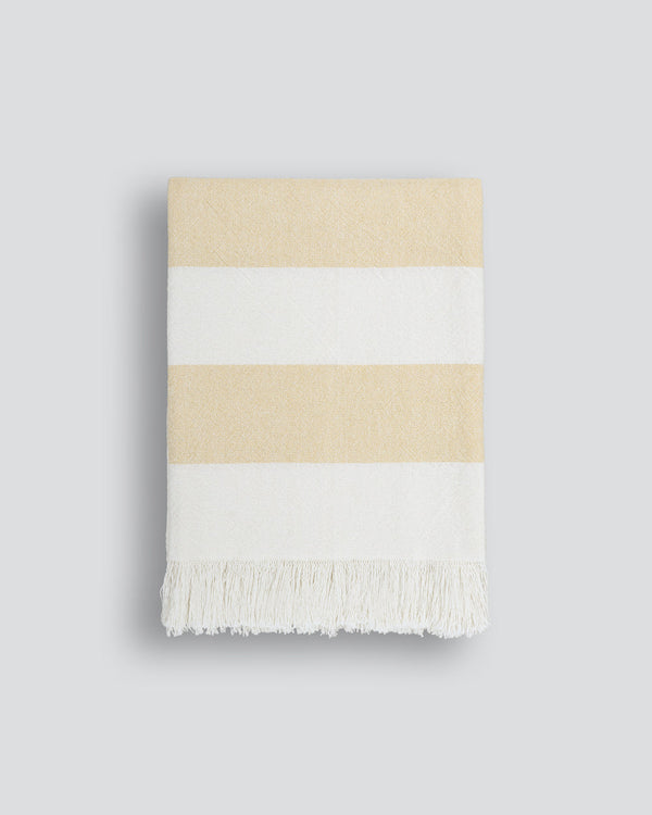 Cheltenham Throw Add a touch of summer to your home with this Cheltenham Throw. Made of 100% cotton, it features a wide stripe design in a delicate powdery blue color. The cross-woven pattern with white detailing and frayed edges brings to mind carefree p