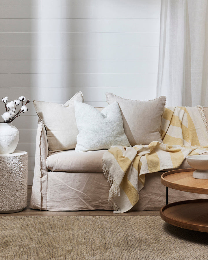 Cheltenham Throw Add a touch of summer to your home with this Cheltenham Throw. Made of 100% cotton, it features a wide stripe design in a delicate powdery blue color. The cross-woven pattern with white detailing and frayed edges brings to mind carefree p
