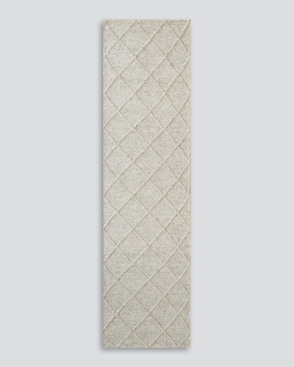 Dakota Floor Runner Create a contemporary feel in any entrance or passageway with this simple wool-blend runner in a natural straw tone. The Dakota brings warmth and interest to transition spaces with its subtle colourway and classic diamond patterning. A