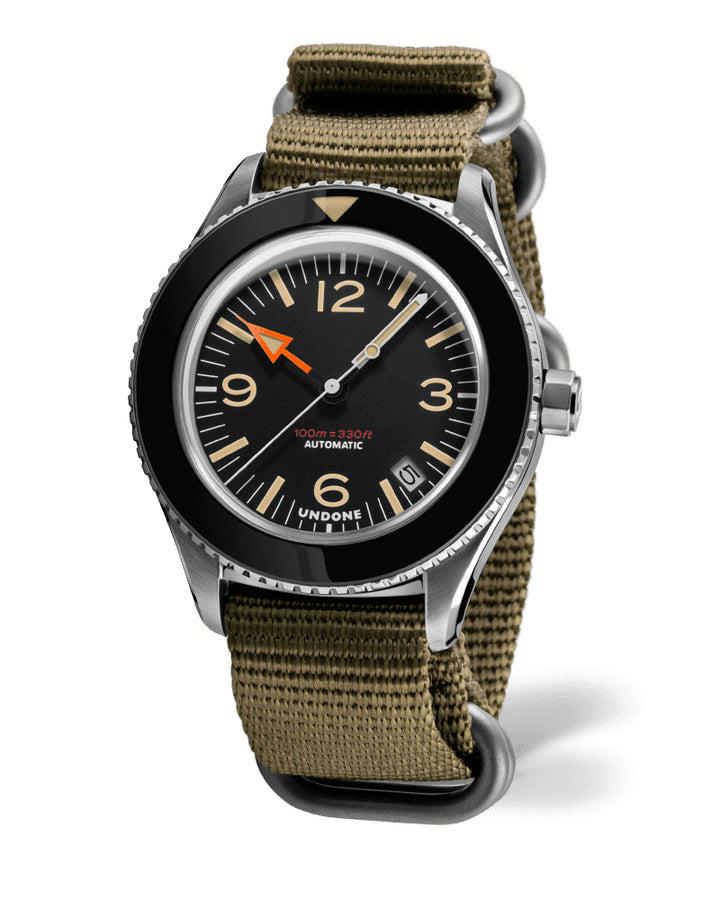 Buy online & save Undone Basecamp - Classic Original |Undone |BEON.COM.AU THE ESSENTIAL MILITARY WATCH A gutsy, good-looking tool watch that combines high-performance functionality with vintage aesthetics. Featuring an iconic orange hour hand with matching strap, a sterile bezel and ultra-domed plexi crystal, the 40mm UNDONE Basecamp is designed with the style, comfort... Undone at BEON.COM.AU