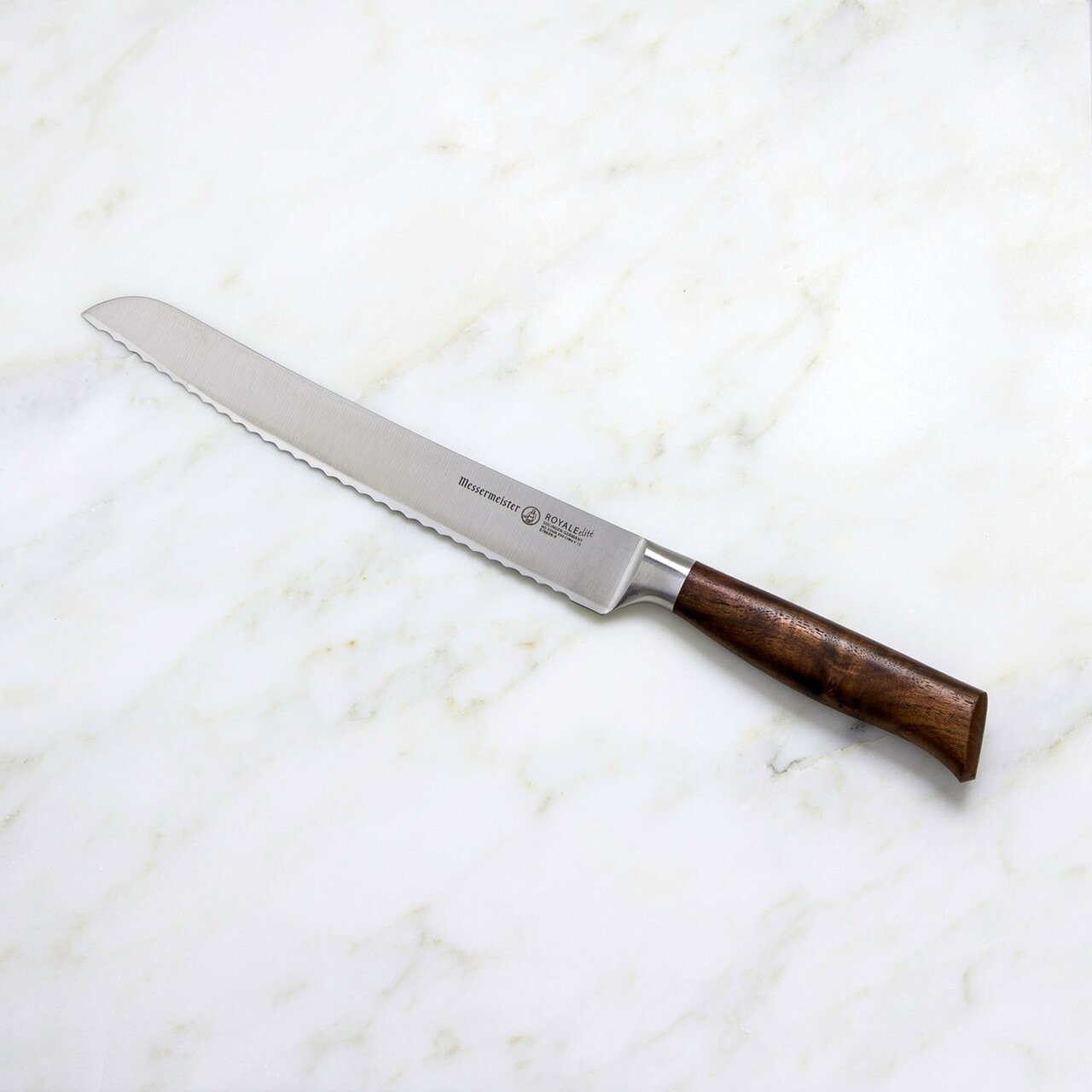 BEON.COM.AU E9699 9         Royal Elite Scalloped Bread Knife 9 Inch The scalloped edge of the Messermeister Royale Elité 9 Inch Bread Knife bites into the crust of bread. This allows for smooth slicing with effortless pressure to avoid compressing your slice.  This knife is also used to slice through soft-s... Messermeister at BEON.COM.AU