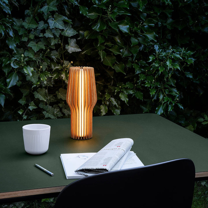 Buy Eva Solo Radiant Table Lamp in Oak Table Lamps The Eva Solo Radiant Table Lamp in Oak is the perfect way to infuse "hygge" into your home. Cordless and with a touch-sensitive switch, it can easily be placed on your bookshelf or patio to create an invi