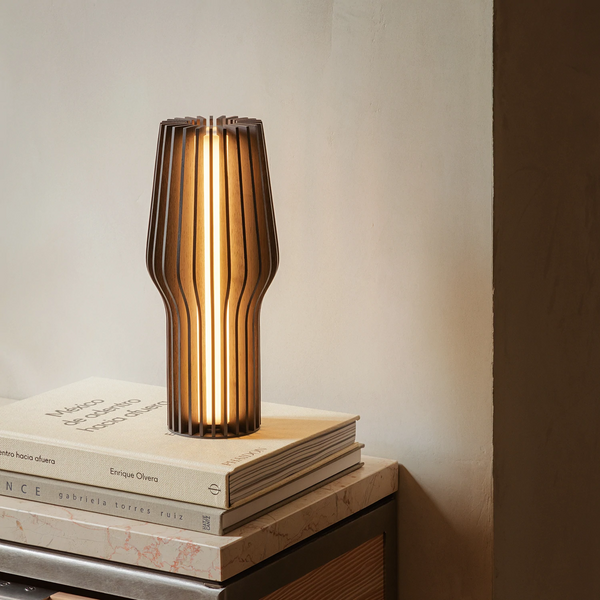 Buy Eva Solo Radiant Table Lamp in Smoke Table Lamps Add a touch of hygge to any space with the Eva Solo Cordless Table Lamp. Featuring a smoke-coloured design, this lamp is ideal for brightening up shelves, balconies, and patios without the hassle of cor