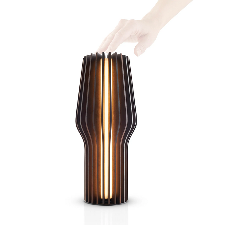 Buy Eva Solo Radiant Table Lamp in Smoke Table Lamps Add a touch of hygge to any space with the Eva Solo Cordless Table Lamp. Featuring a smoke-coloured design, this lamp is ideal for brightening up shelves, balconies, and patios without the hassle of cor