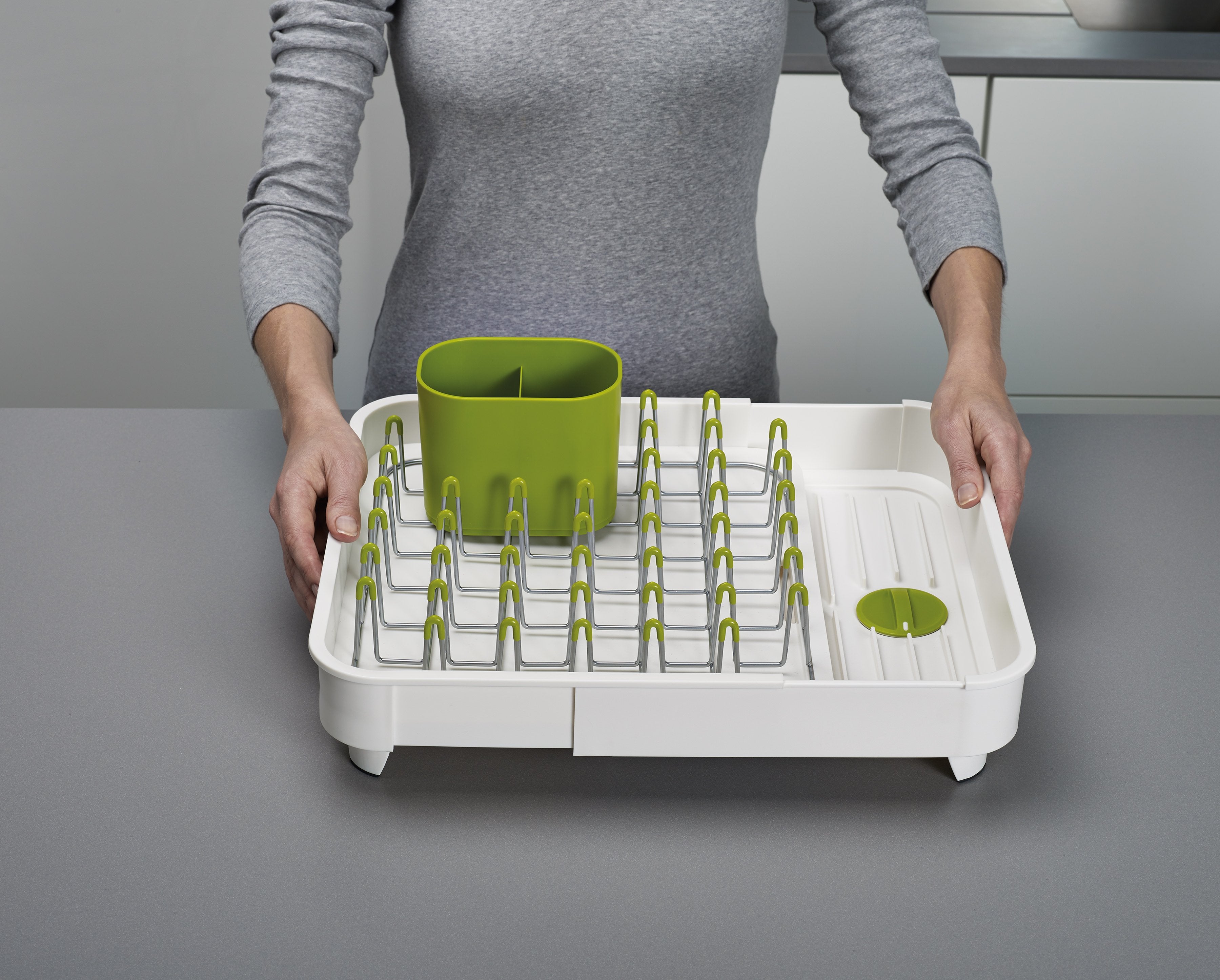 BEON.COM.AU  This versatile dish rack allows you to quickly and easily expand your dish drying space to almost twice its size when needed.  Extends to almost twice its size to hold more items when needed Integrated plug can be set to trap water for draining later Raised ribs prevent water being trapped under... Joseph Joseph at BEON.COM.AU