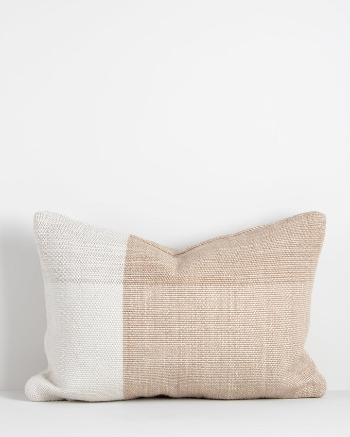 Finn Cushion Embrace outdoor luxury with the understated design of our Finn cushion. Crafted from durable PET yarn, tones of nougat and ivory are woven into an offset linear design with a textural finish. A versatile lumbar that is suitable for use both i