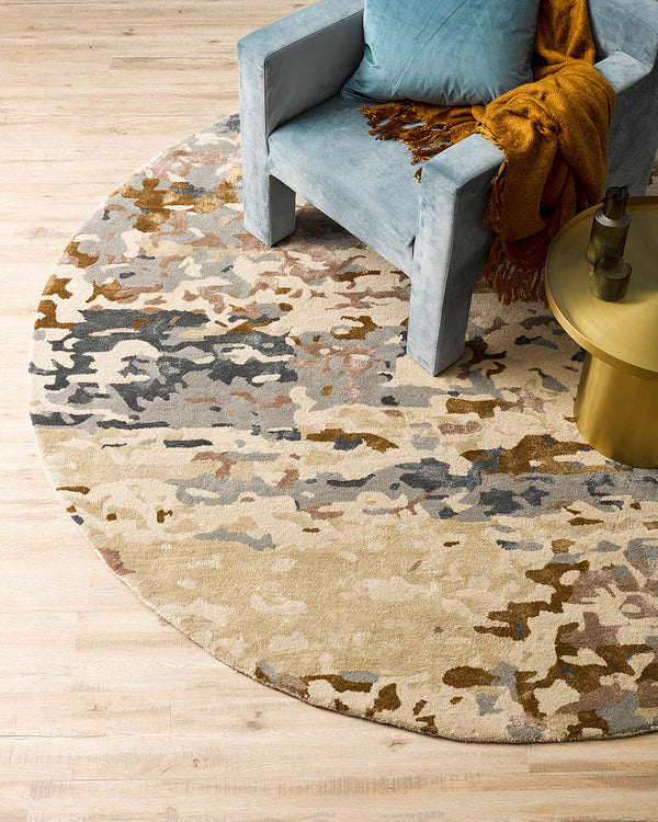 Fleur Round Floor Rug Embrace contemporary luxury with the bold beauty of our Fleur floor rug. Handtufted from a blend of wool and viscose, this piece creates a dramatic space with its rich colour, abstract pattern and soft underfoot texture. This circula