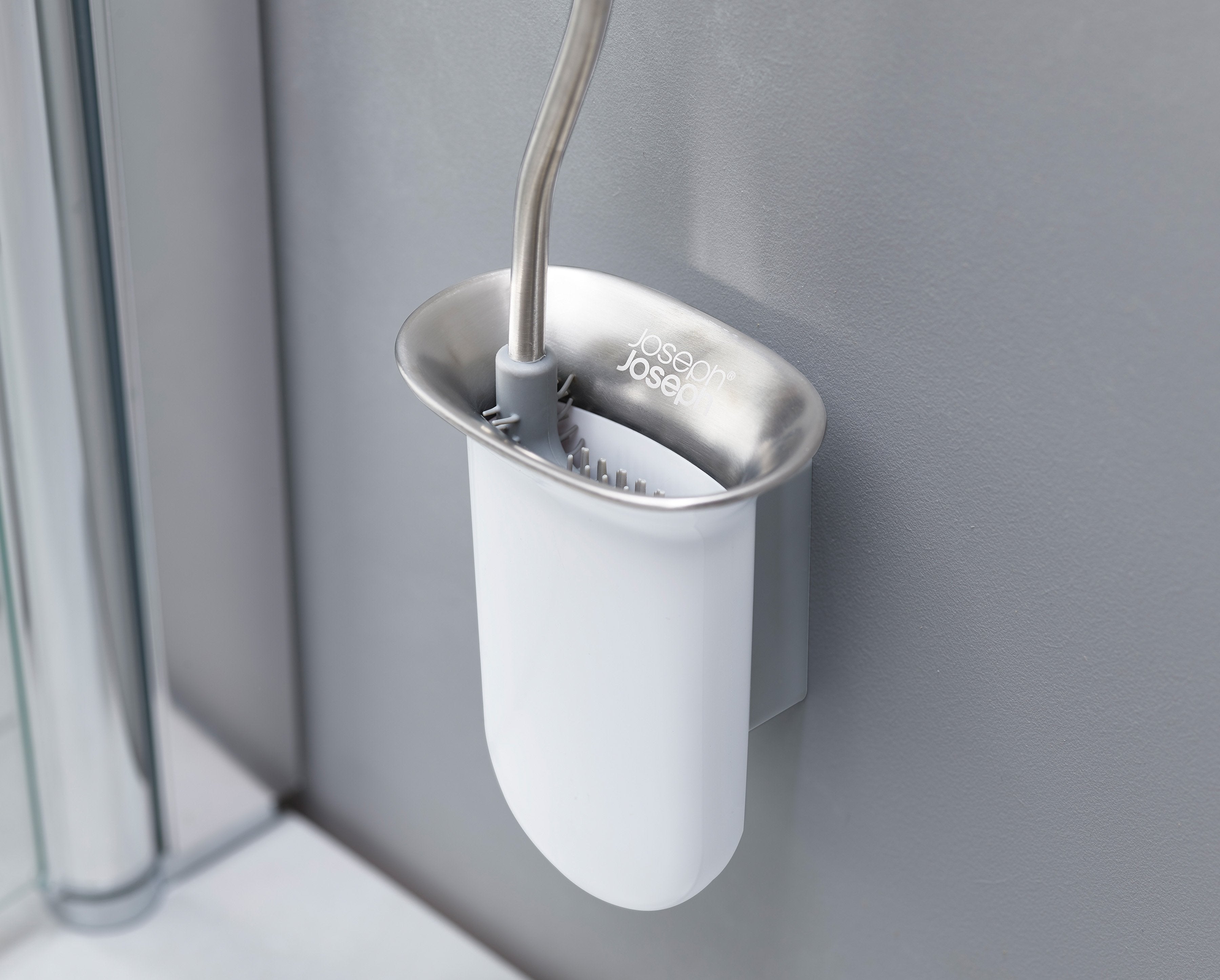 BEON.COM.AU  This version of our bestselling toilet brush comes with a smart wall-mounted holder which saves valuable floor space and makes cleaning easier.  Flexible, D-shaped head reaches all areas, even under the rim Anti-drip: less dripping between cleaning and storing Anti-clog: wide bristle spacing ens... Joseph Joseph at BEON.COM.AU