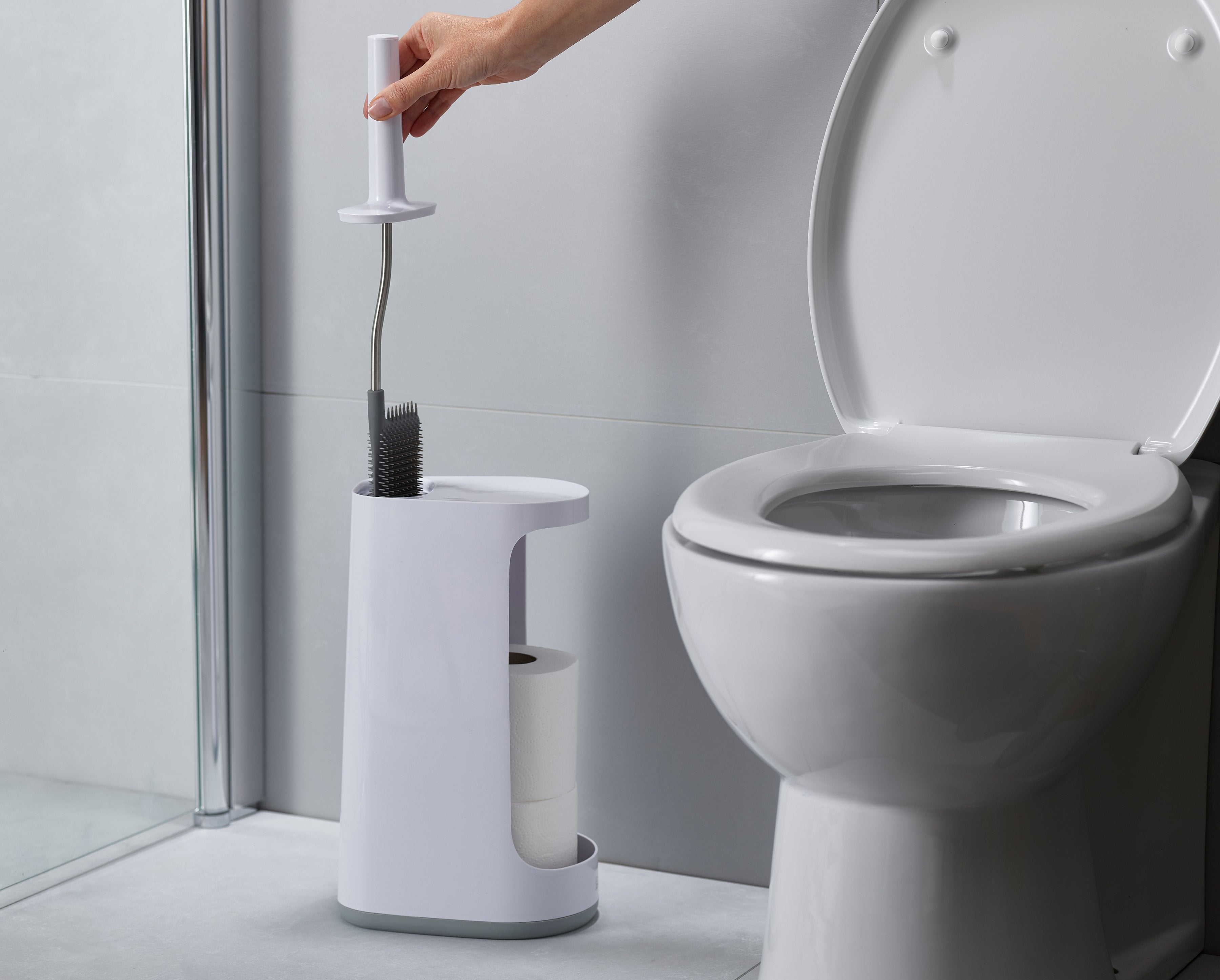 BEON.COM.AU  This innovative storage solution comprises a revolutionary Flex™ toilet brush in a holder that features an extra-large caddy, which can hold up to three spare toilet rolls or a large cleaning bottle.  Flexible, D-shaped head reaches all areas, even under the rim Anti-drip: less dripping between ... Joseph Joseph at BEON.COM.AU