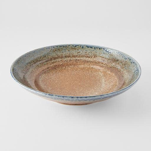 Save on Serving Bowl 29cm / Earth & Sky Glaze Made in Japan at BEON. The Earth & Sky range is designed and made at the Ichi kiln in Gifu prefecture, Japan.29cm diameter6cm heightMade of 'Minoyaki' porcelain, fired at a high temperature and hand finished at the Ichi kiln in Gifu prefecture, Japan. The Earth & Sky range features a hand-dipped edge of bold ink-blue contrasted with a speckled tawny brown. The kiln has over 70 skilled craftspeople. They work with a large variety of glazes and use a unique hand-f