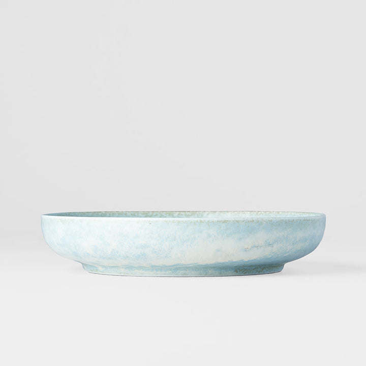 Save on High rim Plate 20cm / Soda Blue Glaze Made in Japan at BEON. The Soda Blue range is designed and made at the Taka kiln in Gifu prefecture, Japan.20cm diameter4cm heightMade of 'Minoyaki' porcelain, fired at a high temperature and hand finished at the Taka kiln in Gifu prefecture, Japan. The Soda Blue range features a soft pastel blue, highlighted by a gentle play of white. Each piece has a unique pattern determined by its position in the kiln during the firing process. Focusing on simple, practical