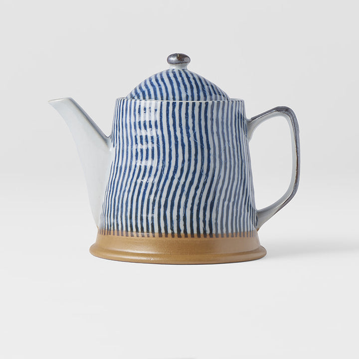 Save on Teapot 400ml / Wave Glaze Made in Japan at BEON. The Wave range is designed and made at the Ko family kiln in Gifu prefecture, Japan.12.5cm height400ml capacityMade of 'Minoyaki' porcelain and hand finished at the Ko kiln in Gifu prefecture, Japan. The Ko Family kiln specialises in crafting small items that require patience and care. Tiny dishes, tea and sake cups plus their popular single flower vases can always be seen lined up on drying shelves in various stages of production. Ko-san's parents ha